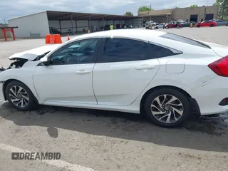2016 Honda Civic EX with VIN 19XFC2F70GE237560, listed as a IAAI auction lot 42131803 with 189,003 mi miles and . Bid and sale history available at DreamBid. Image 14.