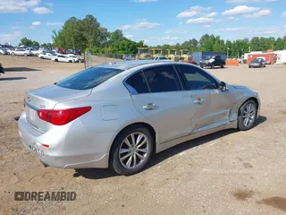 2015 Infiniti Q50 Premium z VIN JN1BV7AP1FM346254, wystawiony jako IAAI lot #42147947 z przebiegiem 147 737 mil mil oraz . Historia ofert i sprzedaży dostępna na DreamBid. Obrazek 4.