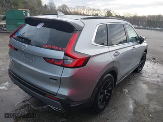 2023 Honda CR-V Hybrid Sport with VIN 2HKRS5H54PH706805, listed as a IAAI auction lot 41599563 with 90,581 mi miles. Bid and sale history available at carsss.com. Image 4.