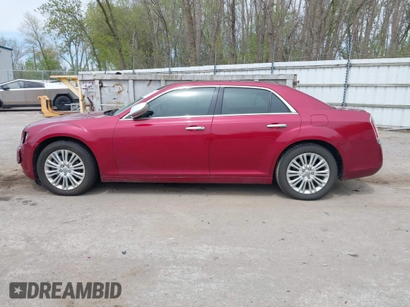 2012 Chrysler 300 C with VIN 2C3CCAKTXCH220185, listed as a IAAI auction lot 42110327 with 57,682 mi miles and . Bid and sale history available at DreamBid. Image 14.