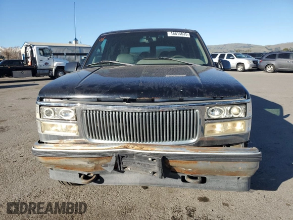 1996 GMC Yukon with VIN 1GKEK13R1TJ741714, listed as a Copart auction lot 46814635 with 406,969 mi miles and Salvage Title. Bid and sale history available at carsss.com. Image 5.