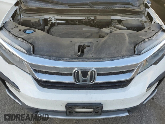 2020 Honda Pilot Touring 7-Passenger z VIN 5FNYF6H68LB002405, wystawiony jako Copart lot #46857625 z przebiegiem 69 617 mil mil oraz Szkoda całkowita • Salvage title. Historia ofert i sprzedaży dostępna na DreamBid. Obrazek 12.