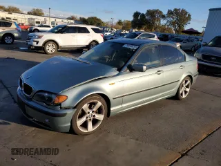 2005 BMW 3 Series 325i with VIN WBAAZ33465KW75385, listed as a Copart auction lot 79970634 with 219,505 mi miles and Salvage title. Bid and sale history available at DreamBid. Image 1.