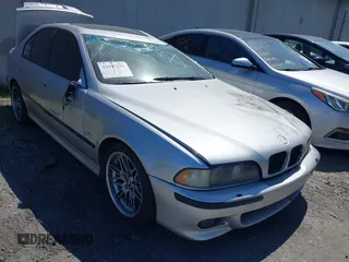 2000 BMW M5 z VIN WBSDE9349YBZ96946, wystawiony jako IAAI lot #42043141 z przebiegiem 107 000 mil mil oraz . Historia ofert i sprzedaży dostępna na DreamBid. Obrazek 1.