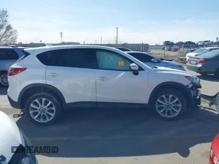 2015 Mazda CX-5 Grand Touring with VIN JM3KE4DY5F0526335, listed as a IAAI auction lot 41756046 with 1 mi miles. Bid and sale history available at carsss.com. Image 13.