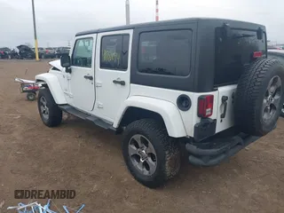 2017 Jeep Wrangler Unlimited 75th Anniversary z VIN 1C4BJWEG9HL684152, wystawiony jako IAAI lot #41880074 z przebiegiem 91 847 mil mil oraz . Historia ofert i sprzedaży dostępna na DreamBid. Obrazek 3.
