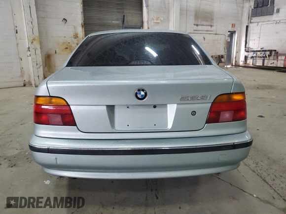 1998 BMW 5 Series 528iA with VIN WBADD6328WBW40098, listed as a Copart auction lot 52914675 with 249,562 mi miles and Salvage Title. Bid and sale history available at carsss.com. Image 6.