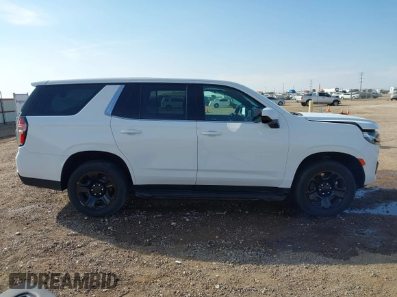 2021 Chevrolet Tahoe Commercial with VIN 1GNSKLED2MR374859, listed as a IAAI auction lot 40736376 with 83,417 mi miles and . Bid and sale history available at DreamBid. Image 14.