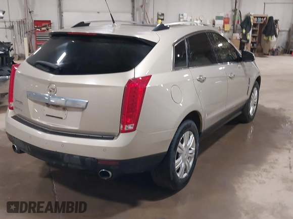 2011 Cadillac SRX Luxury Collection with VIN 3GYFNDEY3BS660007, listed as a IAAI auction lot 41780839 with 203,651 mi miles. Bid and sale history available at carsss.com. Image 4.
