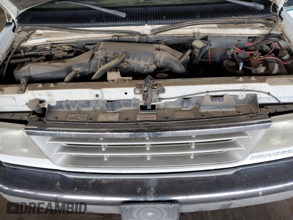 1992 Ford Econoline Cargo z VIN 1FDEE14H7NHA94279, wystawiony jako Copart lot #82831194 z przebiegiem Nie podano mil oraz Czysty tytuł • Clean title. Historia ofert i sprzedaży dostępna na DreamBid. Obrazek 12.