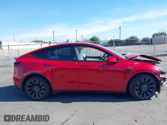 2021 Tesla Model Y Performance with VIN 5YJYGDEF4MF092062, listed as a IAAI auction lot 41583793 with 57,194 mi miles and . Bid and sale history available at DreamBid. Image 13.