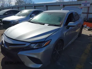 2019 Toyota Camry LE z VIN 4T1B11HK8KU681713, wystawiony jako IAAI lot #41823019 z przebiegiem 99 000 mil mil oraz . Historia ofert i sprzedaży dostępna na DreamBid. Obrazek 17.