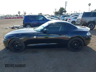 2012 BMW Z4 sDrive28i z VIN WBALL5C56CE716558, wystawiony jako IAAI lot #42065347 z przebiegiem 93 438 mil mil oraz . Historia ofert i sprzedaży dostępna na DreamBid. Obrazek 13.