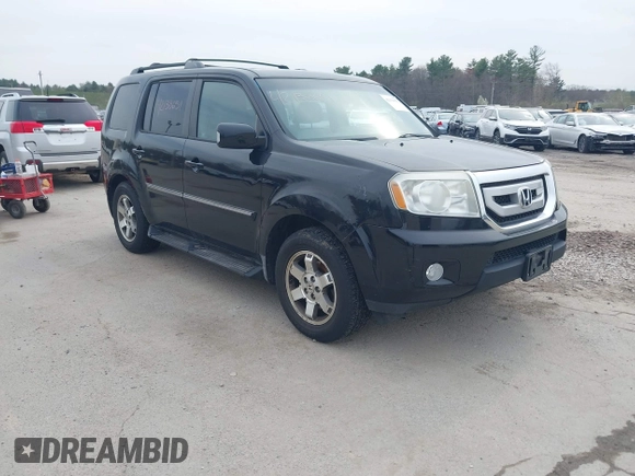 2009 Honda Pilot Touring with VIN 5FNYF48969B055806, listed as a IAAI auction lot 42138651 with 253,623 mi miles and . Bid and sale history available at carsss.com. Image 1.