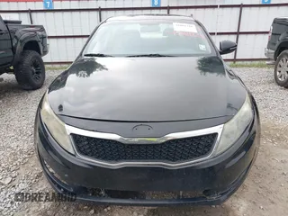 2013 Kia Optima LX z VIN 5XXGM4A74DG214208, wystawiony jako IAAI lot #42081326 z przebiegiem 142 877 mil mil oraz . Historia ofert i sprzedaży dostępna na DreamBid. Obrazek 13.