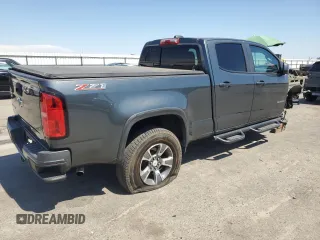 2015 Chevrolet Colorado 2WD Z71 with VIN 1GCGSCE39F1255925, listed as a Copart auction lot 63457735 with 119,801 mi miles and Salvage title. Bid and sale history available at DreamBid. Image 3.