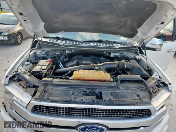 2018 Ford F-150 XL with VIN 1FTFW1EG0JFC00413, listed as a Copart auction lot 63479205 with 204,400 mi miles and Salvage title. Bid and sale history available at DreamBid. Image 11.