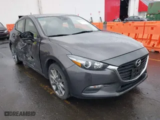 2018 Mazda Mazda3 5-Door Touring with VIN 3MZBN1L33JM204700, listed as a IAAI auction lot 41857344 with 52,873 mi miles. Bid and sale history available at carsss.com. Image 1.