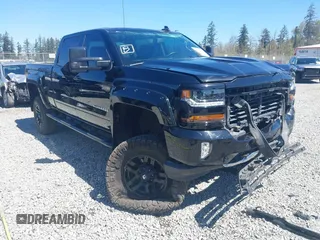 2018 Chevrolet Silverado 1500 LT with VIN 3GCUKREC7JG544365, listed as a IAAI auction lot 42055441 with 57,832 mi miles. Bid and sale history available at carsss.com. Image 1.