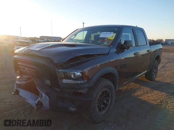 2017 Ram 1500 Rebel z VIN 1C6RR7YT0HS534465, wystawiony jako IAAI lot #41240431 z przebiegiem 125 886 mil mil oraz . Historia ofert i sprzedaży dostępna na DreamBid. Obrazek 2.