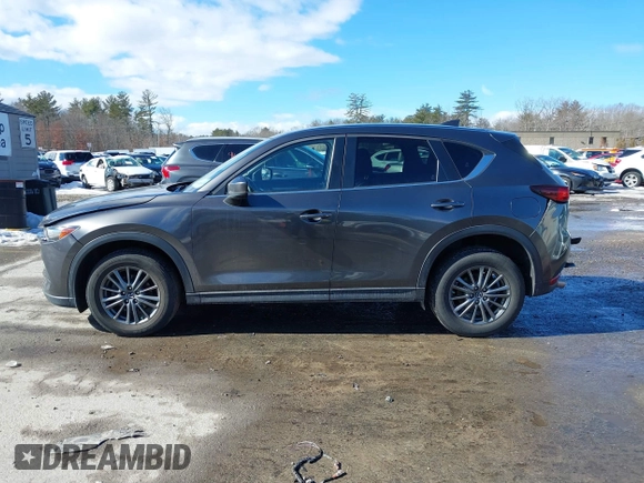 2017 Mazda CX-5 Touring with VIN JM3KFBCL3H0214881, listed as a IAAI auction lot 41694560 with 64,609 mi miles. Bid and sale history available at carsss.com. Image 14.