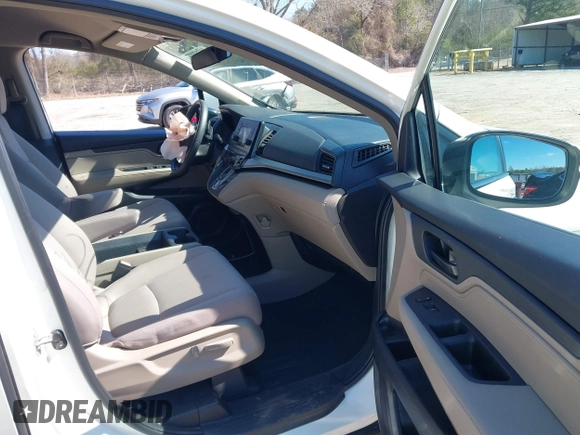 2019 Honda Odyssey LX with VIN 5FNRL6H23KB049236, listed as a IAAI auction lot 41633339 with 96,000 mi miles and . Bid and sale history available at DreamBid. Image 5.