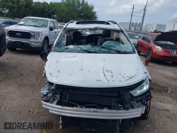 2023 Chrysler Pacifica Limited with VIN 2C4RC1GG4PR619997, listed as a IAAI auction lot 42421682 with 51,520 mi miles and . Bid and sale history available at DreamBid. Image 6.