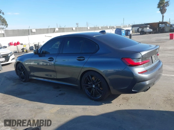 2021 BMW 3 Series 330i z VIN 3MW5R1J08M8B94401, wystawiony jako IAAI lot #41760747 z przebiegiem Nie podano mil oraz . Historia ofert i sprzedaży dostępna na DreamBid. Obrazek 14.
