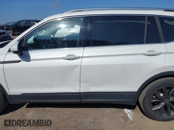 2023 Volkswagen Tiguan SE z VIN 3VVNB7AX9PM121316, wystawiony jako IAAI lot #42138562 z przebiegiem 19 118 mil mil oraz . Historia ofert i sprzedaży dostępna na DreamBid. Obrazek 14.