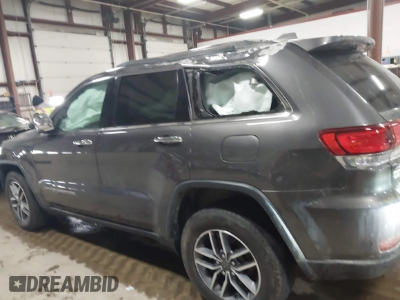 2021 Jeep Grand Cherokee 80th Anniversary with VIN 1C4RJFBG7MC513588, listed as a IAAI auction lot 41441227 with 49,143 mi miles and . Bid and sale history available at DreamBid. Image 14.