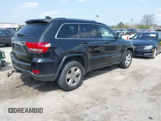 2014 Jeep Grand Cherokee Laredo with VIN 1C4RJFAG1EC315544, listed as a IAAI auction lot 42105987 with 164,430 mi miles. Bid and sale history available at carsss.com. Image 4.