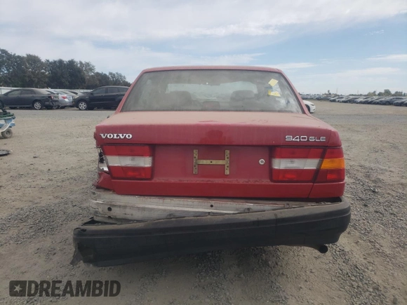 1991 Volvo 900 z VIN YV1JA8943MA045997, wystawiony jako Copart lot #74633174 z przebiegiem 296 013 mil mil oraz Szkody całkowita. Historia ofert i sprzedaży dostępna na DreamBid. Obrazek 6.