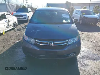 2014 Honda Odyssey Touring with VIN 5FNRL5H94EB081267, listed as a IAAI auction lot 41199509 with 146,827 mi miles and . Bid and sale history available at DreamBid. Image 12.