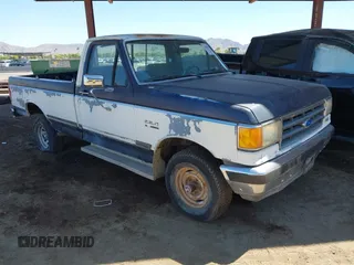 1990 Ford F-150 z VIN 1FTEF14N3LNA55565, wystawiony jako IAAI lot #42843437 z przebiegiem 198 200 mil mil oraz . Historia ofert i sprzedaży dostępna na DreamBid. Obrazek 1.