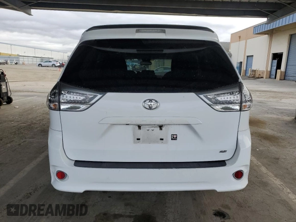 2012 Toyota Sienna SE with VIN 5TDXK3DC9CS215991, listed as a Copart auction lot 51868005 with 215,075 mi miles and Salvage title. Bid and sale history available at DreamBid. Image 6.