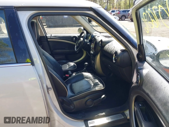 2013 MINI Countryman with VIN WMWZB3C56DWR36117, listed as a IAAI auction lot 42076676 with 168,750 mi miles and . Bid and sale history available at DreamBid. Image 5.