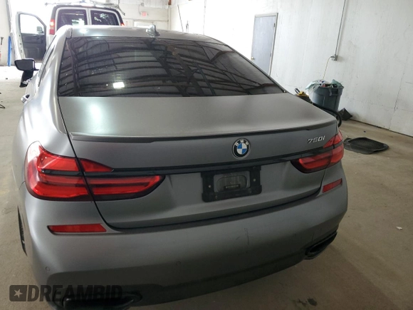 2017 BMW 7 Series 750i with VIN WBA7F0C31HGM22359, listed as a Copart auction lot 56306875 with 90,642 mi miles and Salvage title. Bid and sale history available at DreamBid. Image 6.