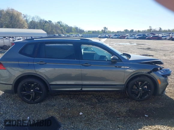 2024 Volkswagen Tiguan SE R-Line Black with VIN 3VVCB7AX2RM114556, listed as a IAAI auction lot 41887373 with 7,013 mi miles and . Bid and sale history available at DreamBid. Image 13.