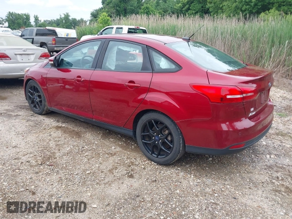 2016 Ford Focus SE with VIN 1FADP3F28GL266971, listed as a IAAI auction lot 42366561 with 67,390 mi miles and . Bid and sale history available at DreamBid. Image 3.