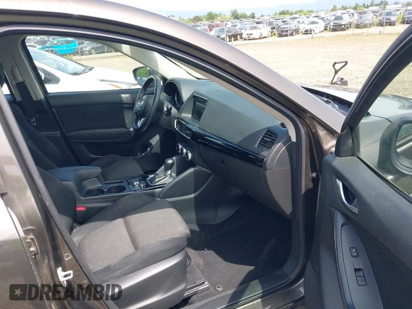 2016 Mazda CX-5 Sport with VIN JM3KE4BY8G0785812, listed as a IAAI auction lot 42324083 with 57,405 mi miles and . Bid and sale history available at DreamBid. Image 5.