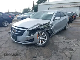 2018 Cadillac ATS Luxury RWD z VIN 1G6AB5RX6J0110860, wystawiony jako IAAI lot #41556662 z przebiegiem 63 886 mil mil oraz . Historia ofert i sprzedaży dostępna na DreamBid. Obrazek 19.