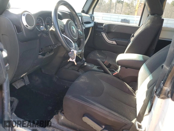 2014 Jeep Wrangler Sahara with VIN 1C4AJWBGXEL125544, listed as a Copart auction lot 51961845 with 146,917 mi miles and Salvage title. Bid and sale history available at DreamBid. Image 7.