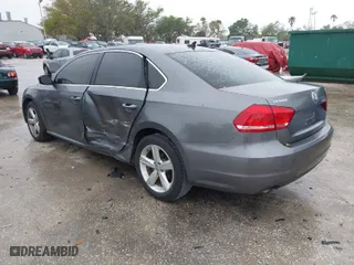 2015 Volkswagen Passat 1.8T Limited Edition with VIN 1VWAT7A34FC089282, listed as a IAAI auction lot 41767239 with 68,156 mi miles. Bid and sale history available at carsss.com. Image 3.