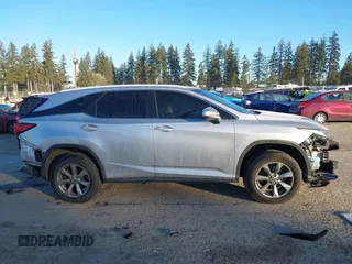 2018 Lexus RX 350L Premium z VIN JTJDZKCAXJ2008164, wystawiony jako IAAI lot #41436168 z przebiegiem 126 798 mil mil oraz . Historia ofert i sprzedaży dostępna na DreamBid. Obrazek 14.