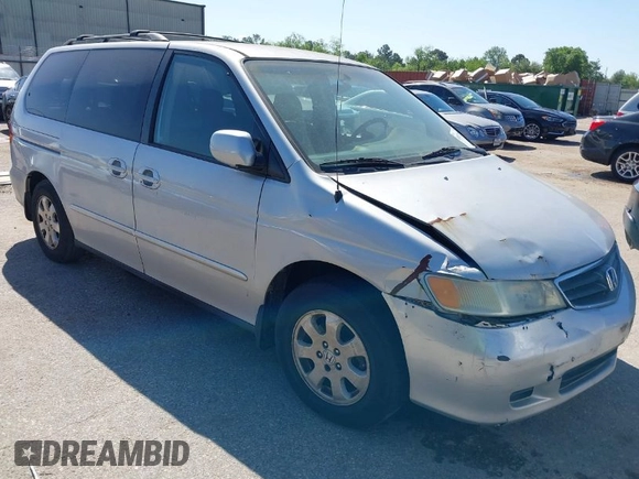 2002 Honda Odyssey EX-L z VIN 5FNRL18062B011890, wystawiony jako IAAI lot #41972294 z przebiegiem 245 889 mil mil oraz . Historia ofert i sprzedaży dostępna na DreamBid. Obrazek 1.