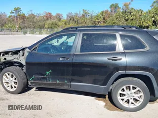 2016 Jeep Cherokee Sport with VIN 1C4PJLAS5GW376259, listed as a IAAI auction lot 41287458 with 92,075 mi miles and . Bid and sale history available at DreamBid. Image 14.