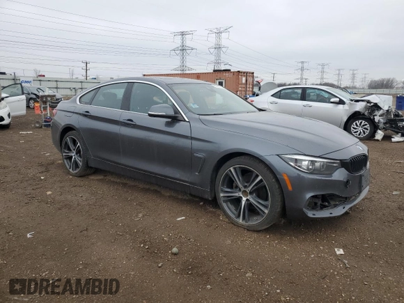 2020 BMW 4 Series 430i xDrive with VIN WBA4J3C00LBL11929, listed as a Copart auction lot 52501055 with 141,791 mi miles and Salvage title. Bid and sale history available at DreamBid. Image 4.