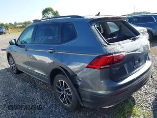 2021 Volkswagen Tiguan S with VIN 3VV1B7AX7MM038431, listed as a IAAI auction lot 42726529 with 82,289 mi miles and . Bid and sale history available at DreamBid. Image 3.