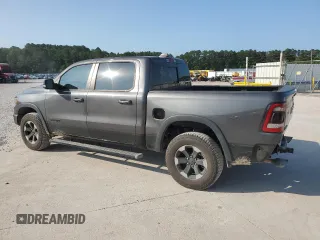 2020 Ram 1500 Rebel with VIN 1C6SRFLT4LN144723, listed as a Copart auction lot 59843935 with 90,936 mi miles and Salvage title. Bid and sale history available at DreamBid. Image 2.