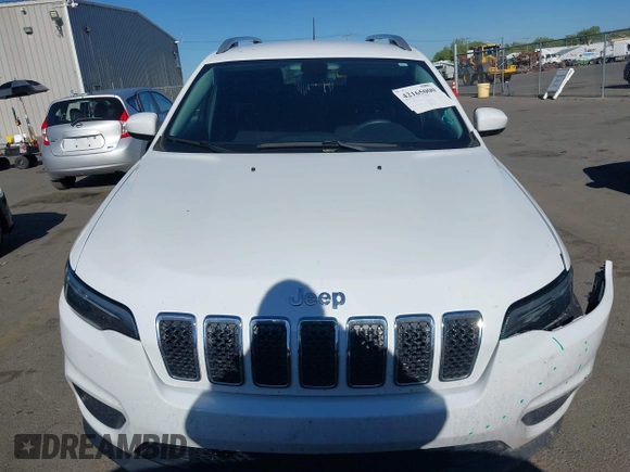 2020 Jeep Cherokee Latitude with VIN 1C4PJMCB0LD502665, listed as a IAAI auction lot 42165000 with 65,159 mi miles and . Bid and sale history available at DreamBid. Image 12.